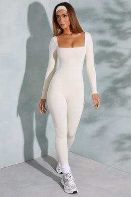 Petite Delanie Square Neck Long Sleeve Jumpsuit in Ivory | Oh Polly