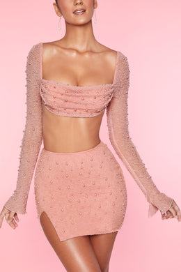 Minifalda con abertura en el muslo y cintura alta en rosa