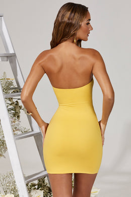 Back view of Aurelia mini dress in yellow