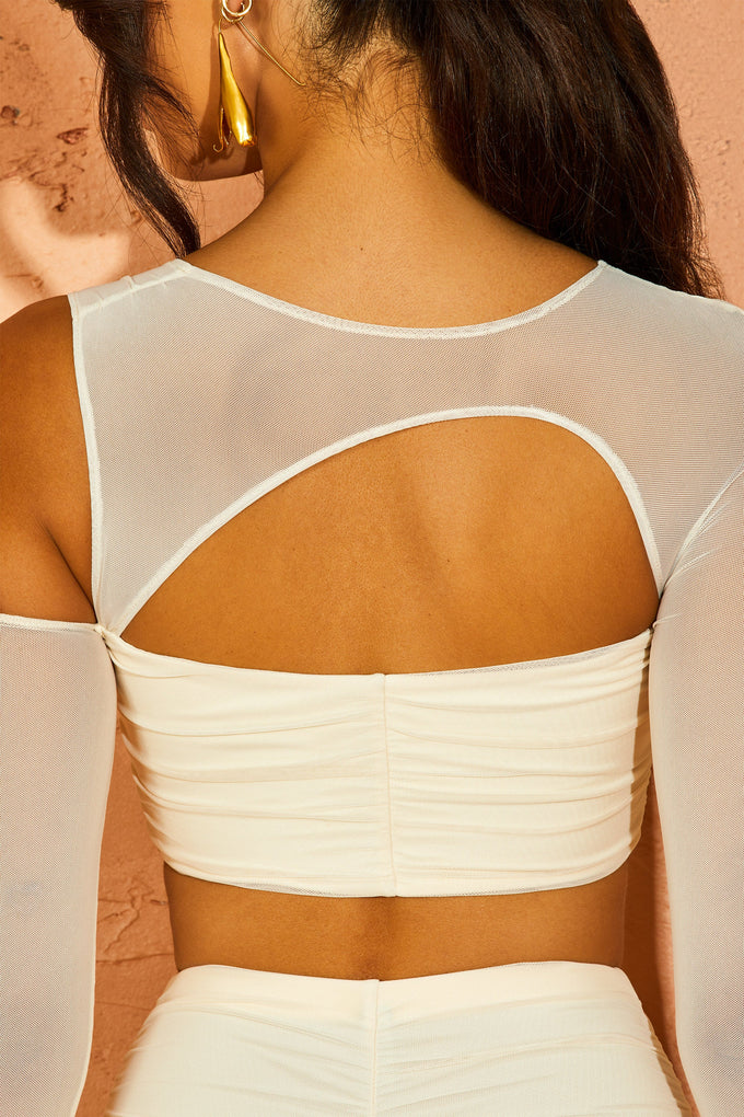 Back view of Asymmetric Cowl Neck Cut Out Crop Top in Ivory