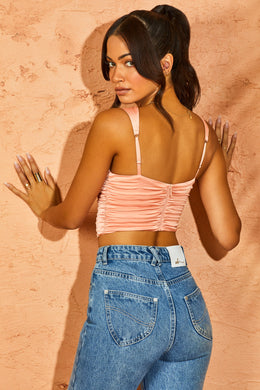 Back view of ruched detail with adjustable straps.