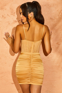 Back view of Ruched Corset Mini Dress in Beige