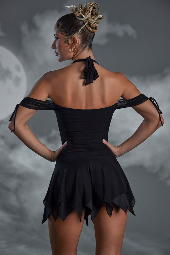 Minivestido con cuello halter y cordones en negro