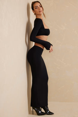 Falda larga ajustada de talle bajo en negro