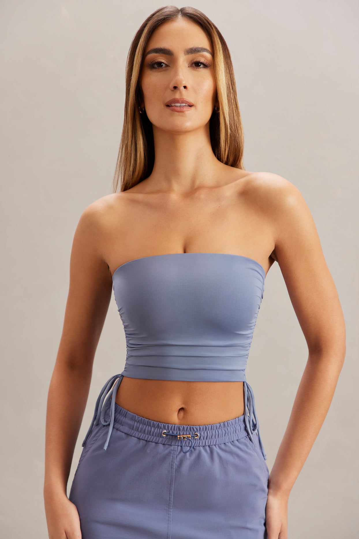 https://us.ohpolly.com/cdn/shop/products/5860_1_Alisa-Blue-Ruched-Bandeau-Top.jpg?v=1689362152&width=1244