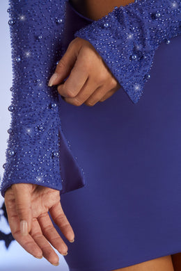 Minivestido recortado de manga larga adornado en azul oscuro