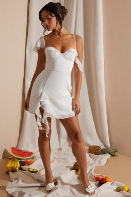 Mini vestido drapeado assimétrico em branco