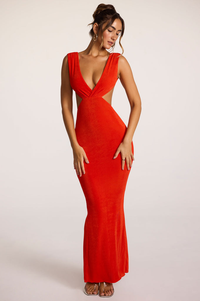 Vestido largo de punto texturizado con escote pronunciado en rojo fuego