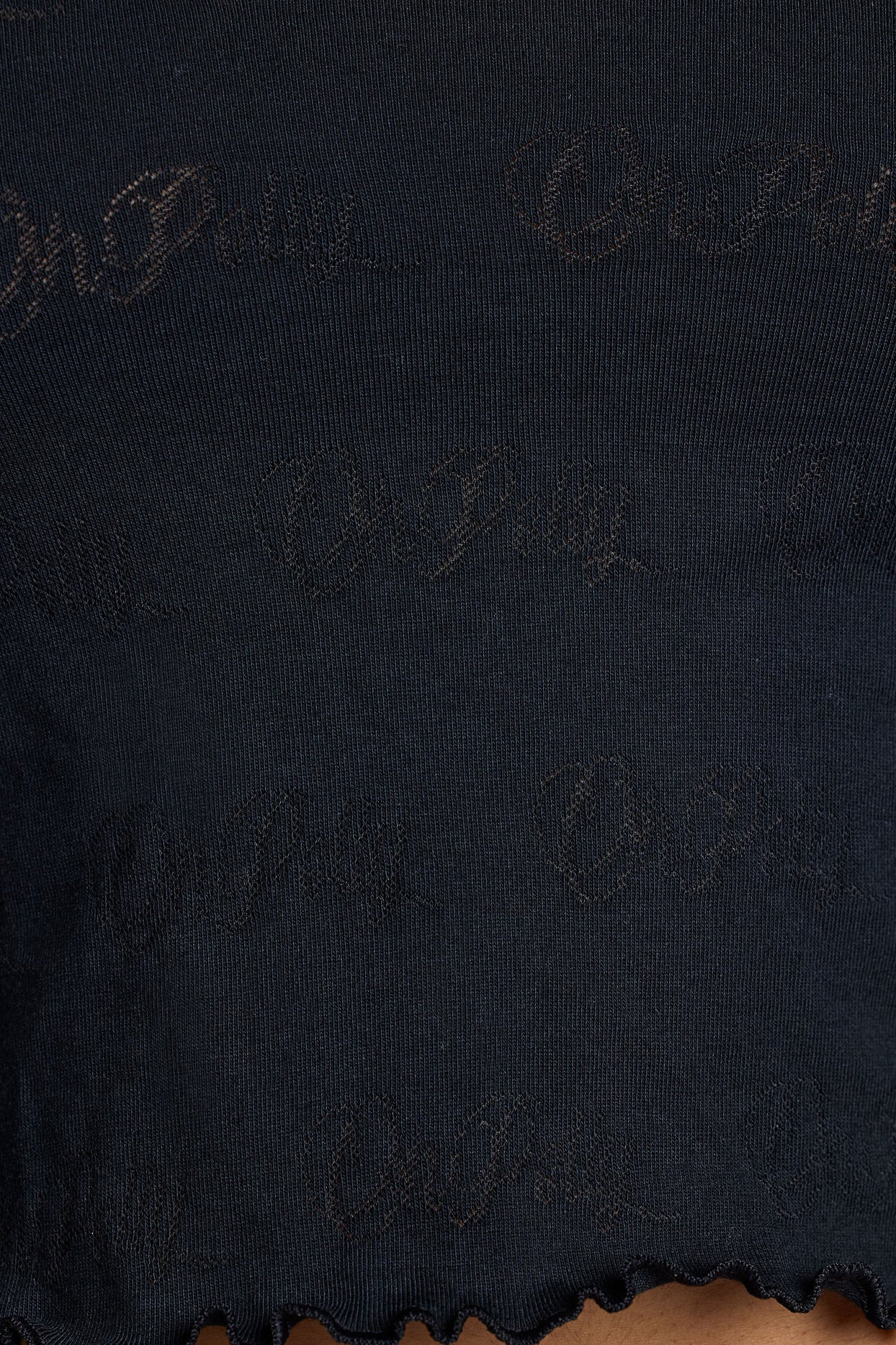 Top curto Pointelle de manga comprida com decote redondo em preto