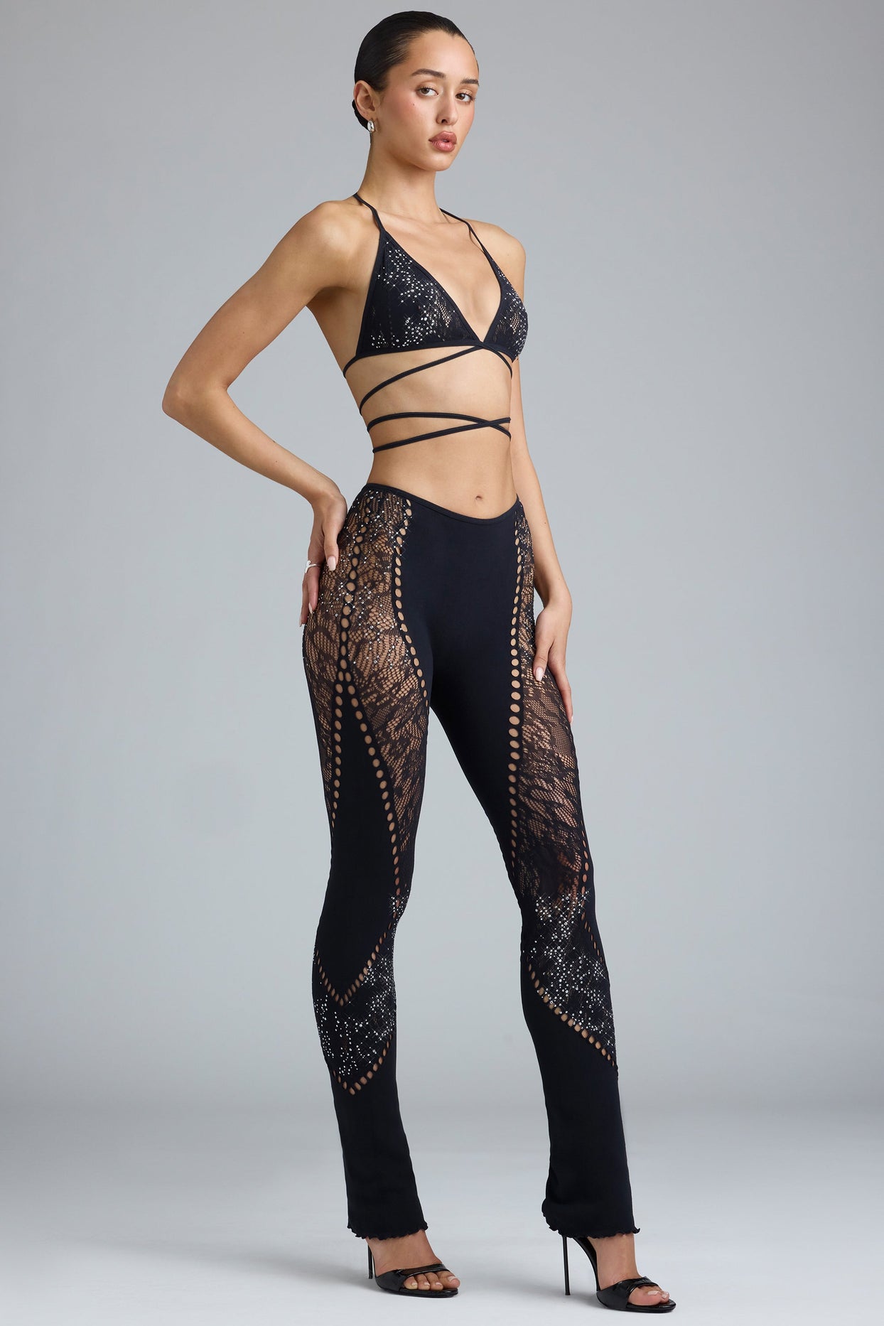 Stevie Embellished Mid-Rise Flared Trousers in Black | Oh Polly