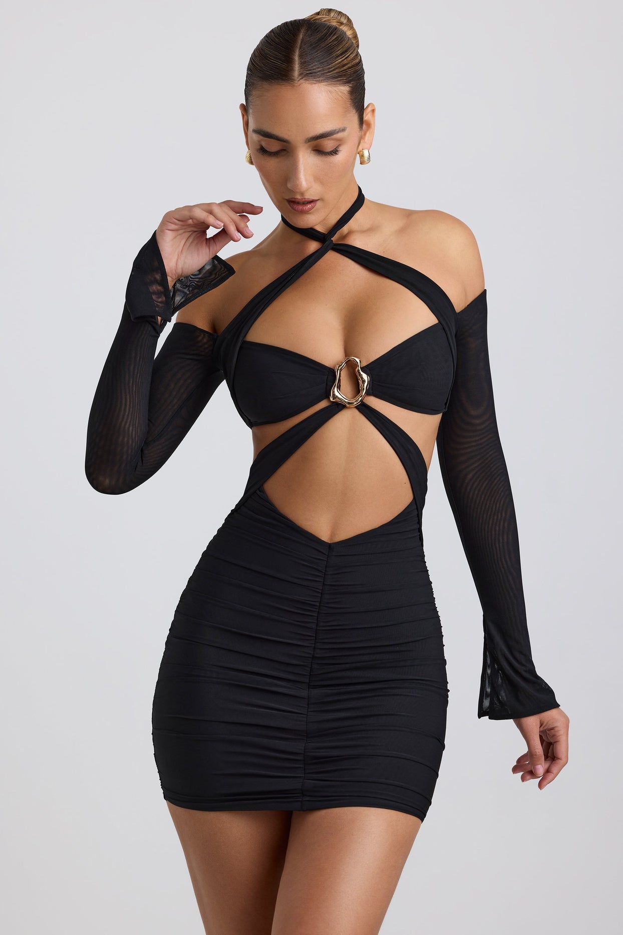 Off-Shoulder Ruched Cut-Out Mini Dress in Black