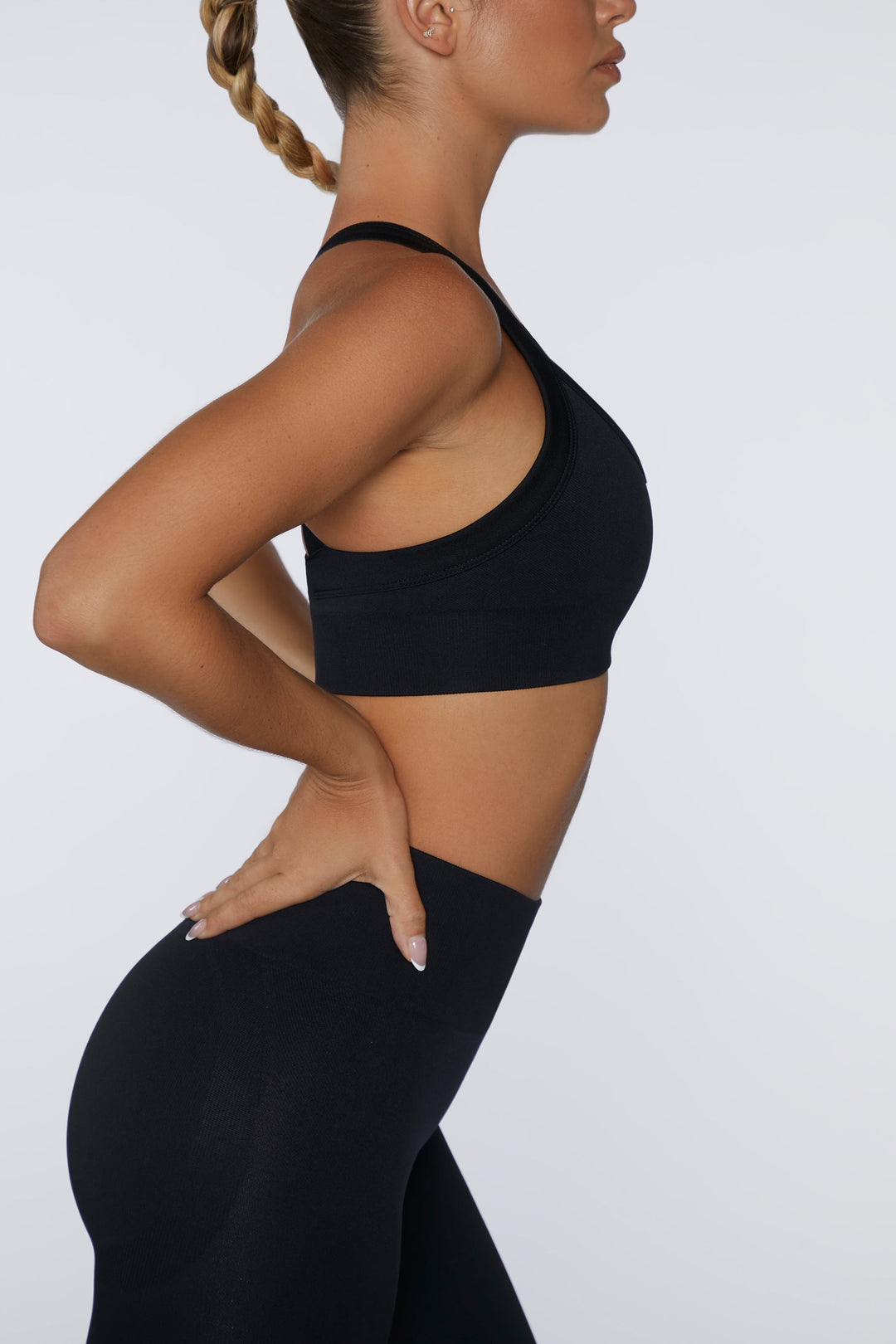 Purpose Cross Back Sports Bra in Black Oh Polly