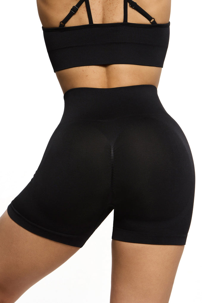 Back view of Seamless High Waist Mini Shorts in Black