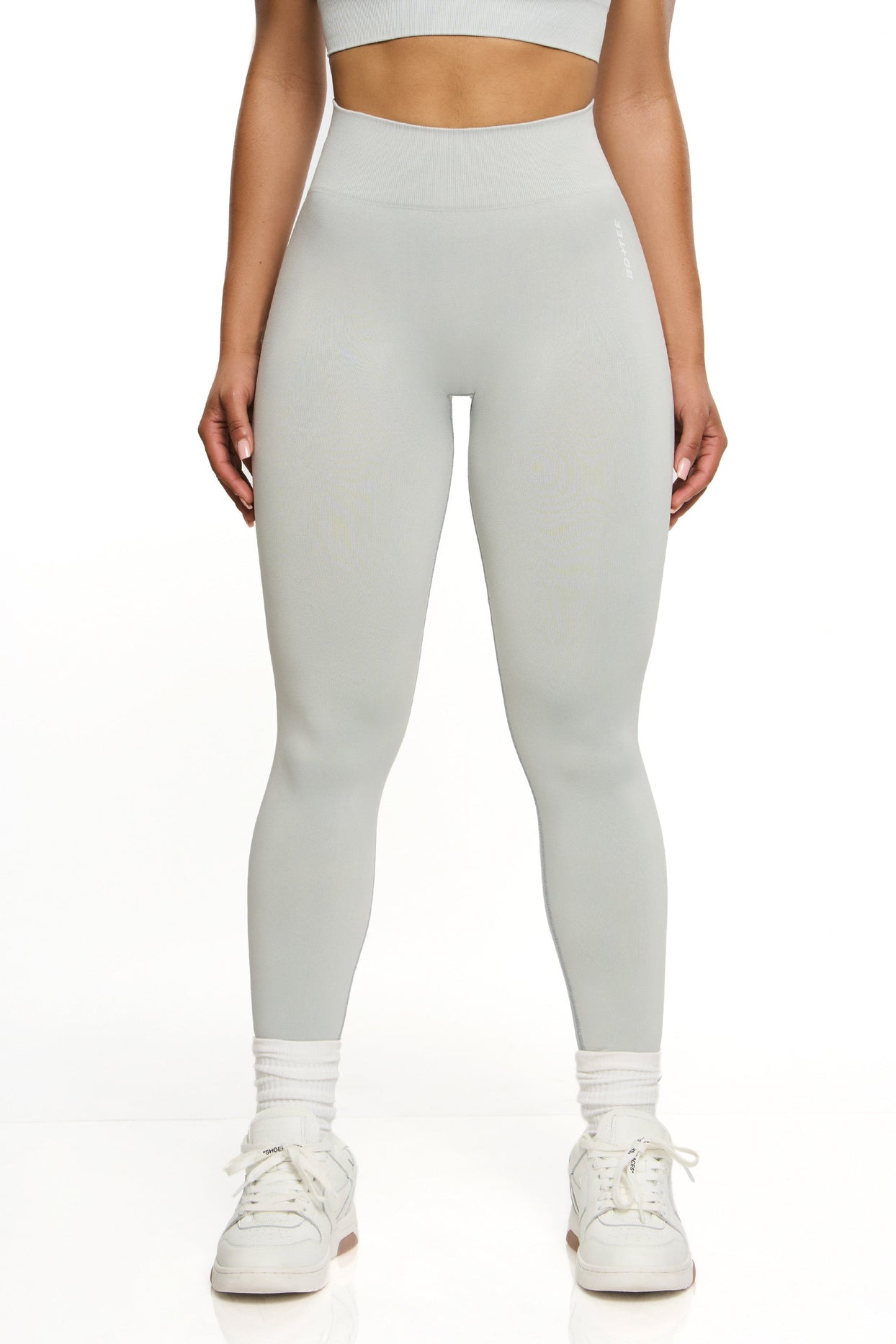 https://us.ohpolly.com/cdn/shop/products/BT0466_2_Grey-High-Waisted-Sports-Leggings_42beee5c-cbc6-49aa-81ca-f0ecfd196eac.jpg?v=1689266200&width=1244