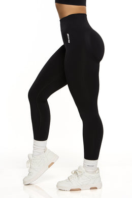 Side  view of high waisted sports leggings in black