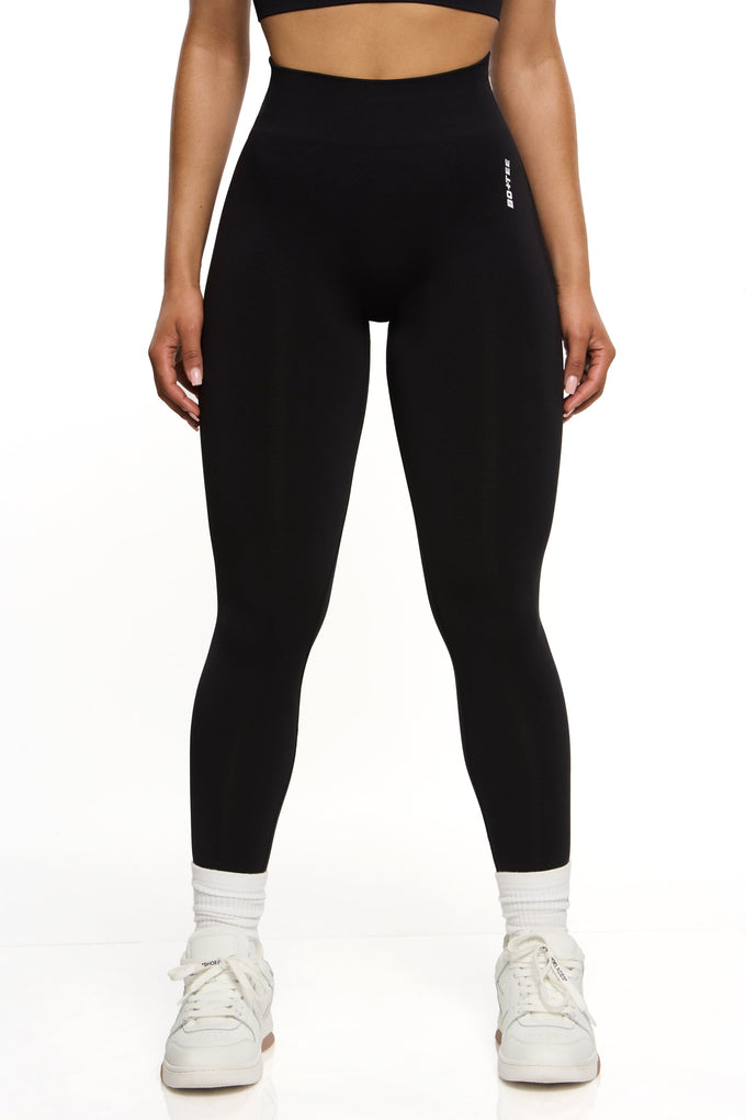Front  view of high waisted sports leggings in black