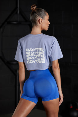 Back view of Cropped T-shirt with biker shorts.