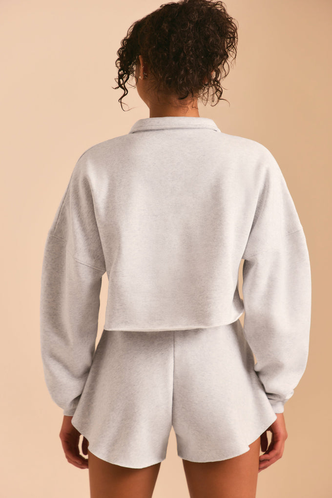 Suéter con media cremallera en gris jaspeado