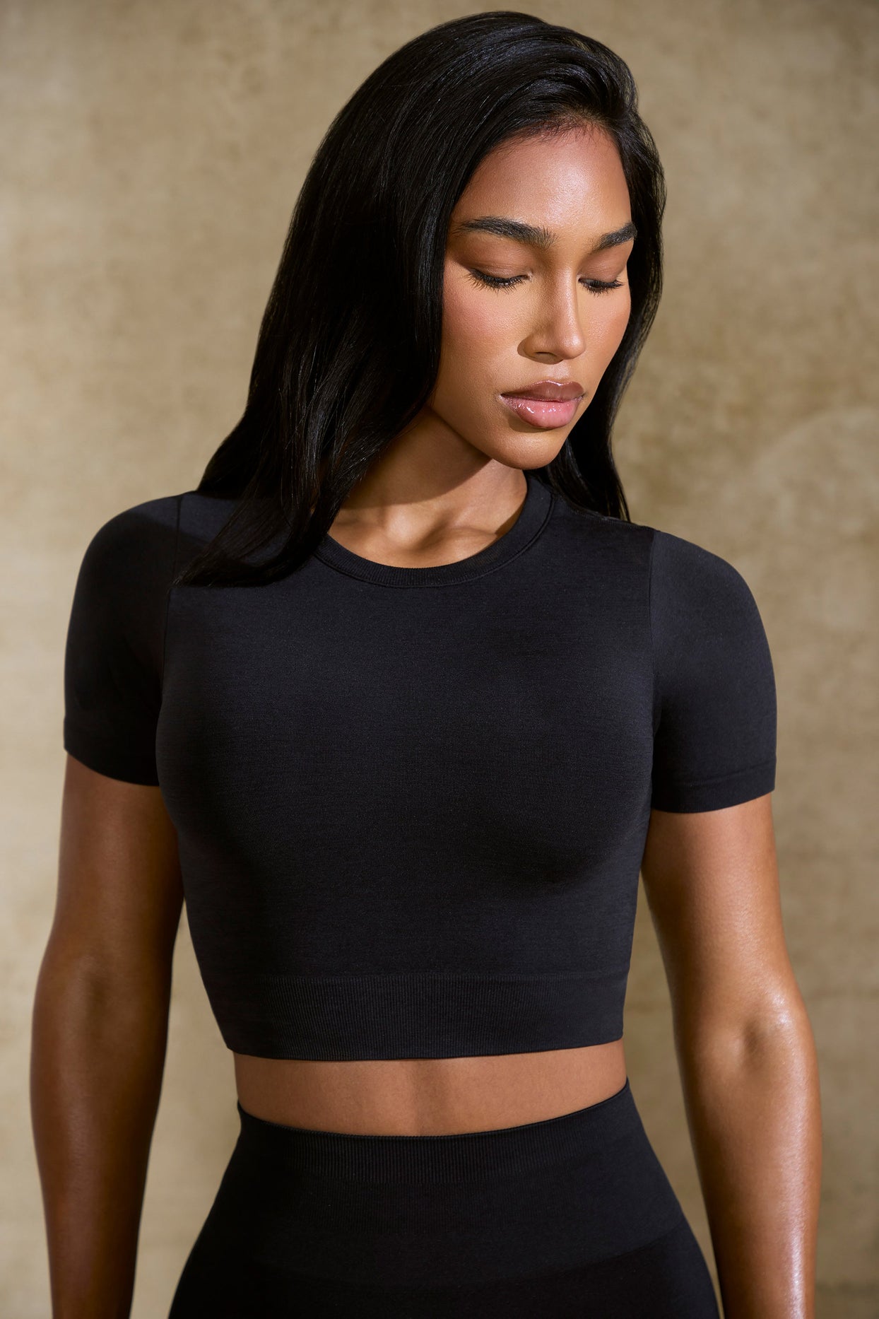 Excel Define Luxe Baby Tee Crop Top in Black | Oh Polly