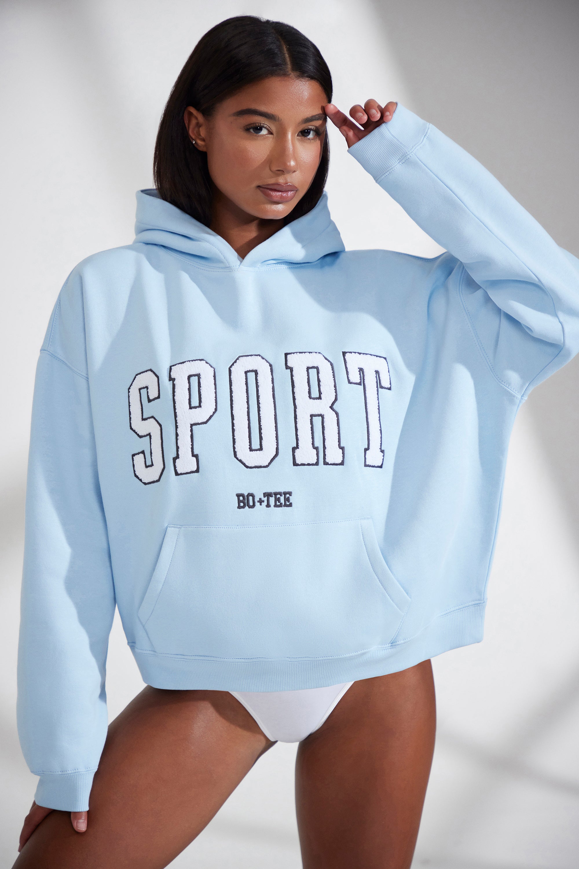 Varsity Oversized Hooded Sweatshirt in Baby Blue | Oh Polly