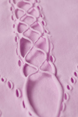 Body con cordones en rosa violeta