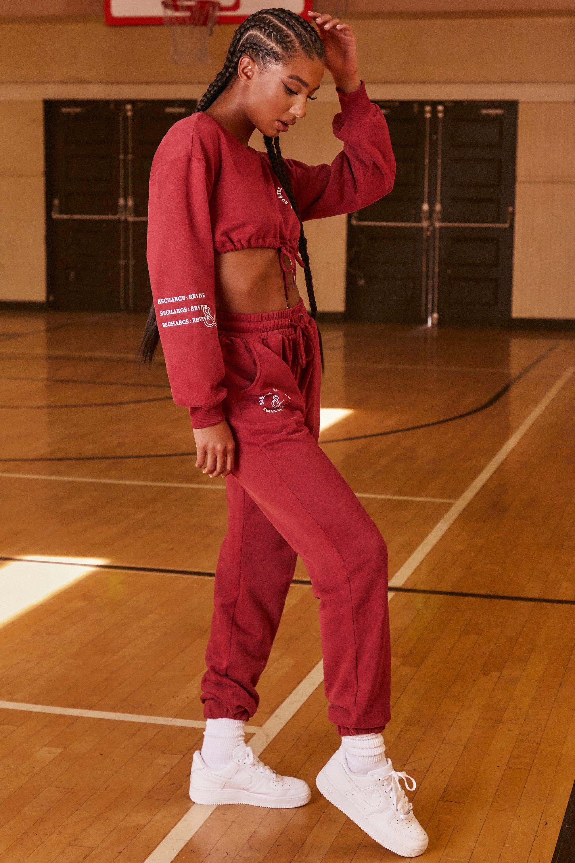 Keep Moving Cropped Drawstring Sweatshirt in Burgundy Oh Polly