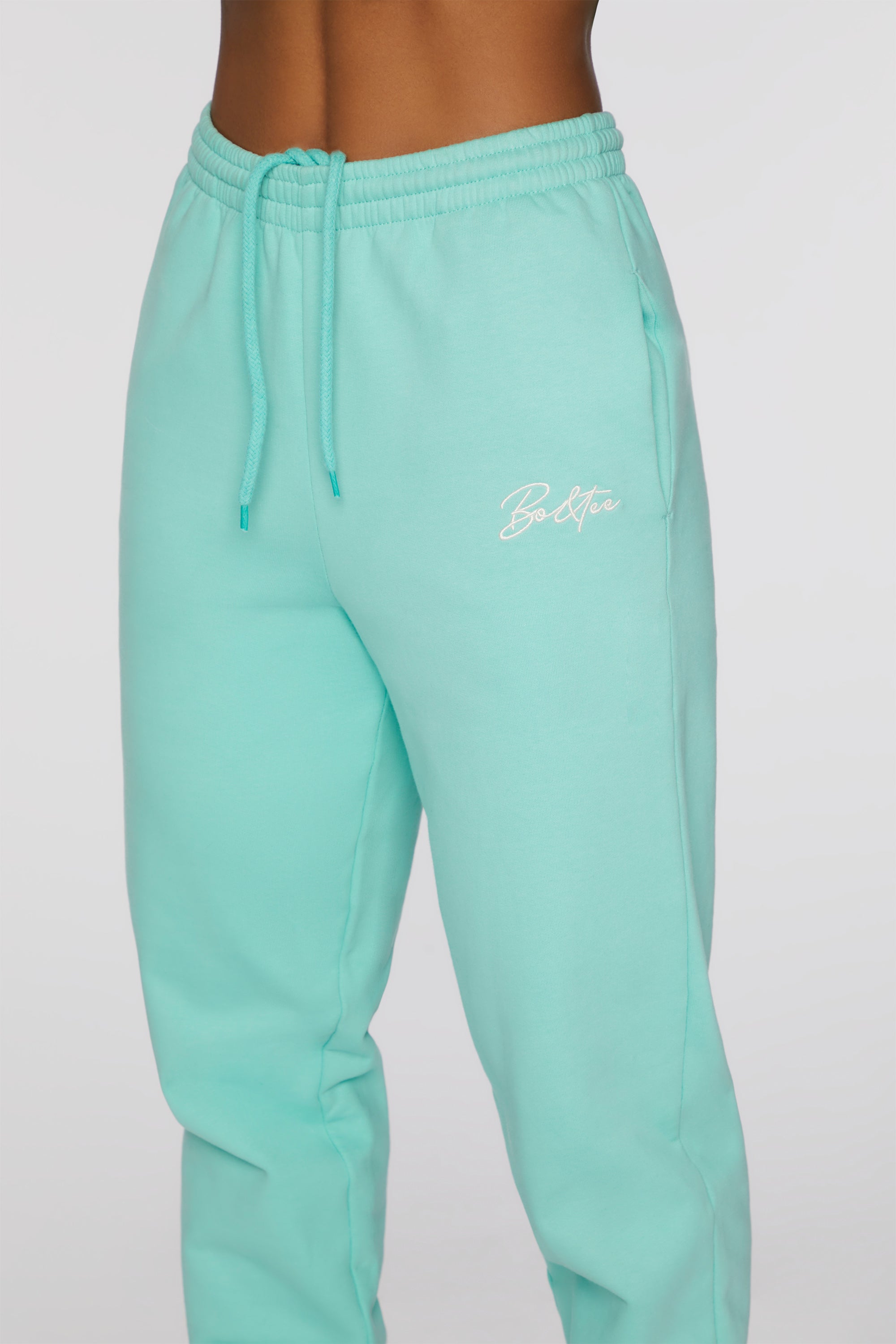 Always Improving Branded Sweatpants in Turquoise | Oh Polly